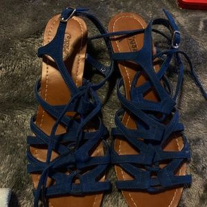 Gladiator blue and brown shorts heels, Carlos Santana